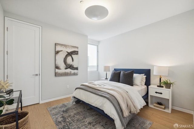 bedroom featuring light hardwood / wood-style floors