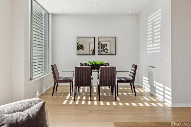 dining space featuring light hardwood / wood-style flooring