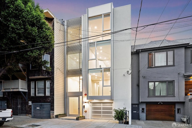 view of front of home with a garage