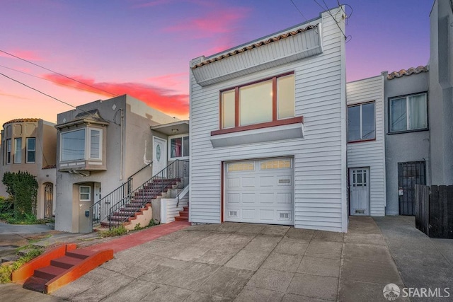 view of front of home featuring a garage