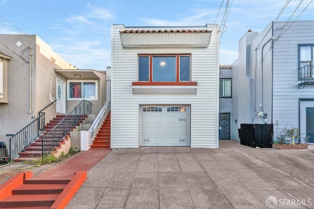 view of front of home with a garage