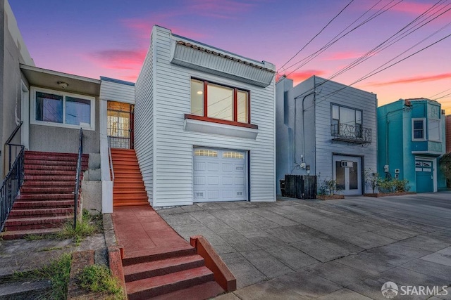 view of front of property with a garage