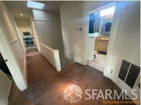 hallway with a skylight