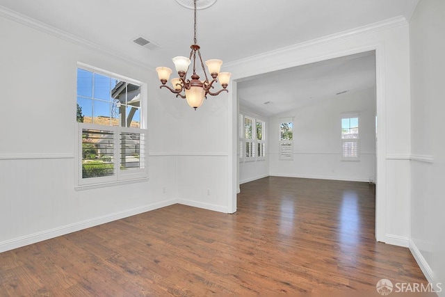 654 Tain Ct, Brentwood, CA 94513 - unfurnished dining area with a chandelier, ornamental molding, wood finished floors, and lofted ceiling