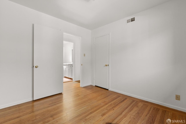 971 Lupin Way Lower, Lower, San Carlos, CA 94070 - unfurnished room featuring light wood-style flooring and baseboards
