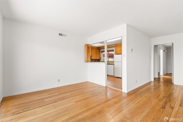 971 Lupin Way Lower, Lower, San Carlos, CA 94070 - unfurnished living room with light wood finished floors and baseboards