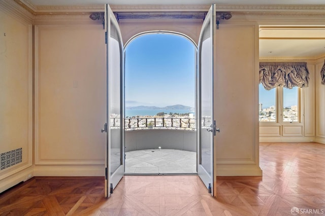 2000 Washington St Unit 4, San Francisco, CA 94109 - doorway to outside featuring healthy amount of natural light, french doors, a mountain view, and a decorative wall