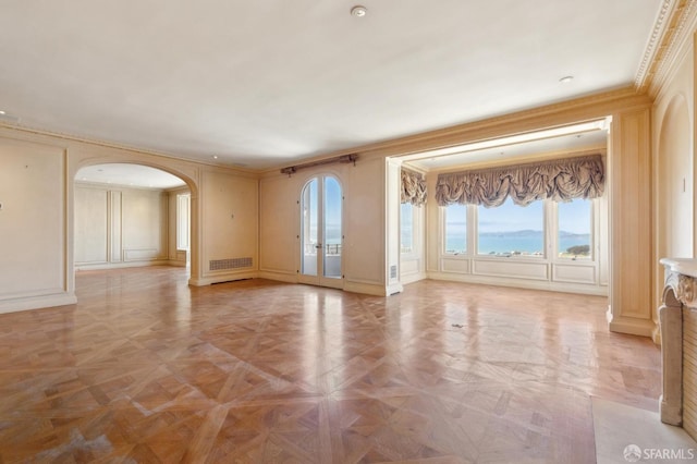 2000 Washington St Unit 4, San Francisco, CA 94109 - unfurnished room with arched walkways, plenty of natural light, crown molding, and a decorative wall