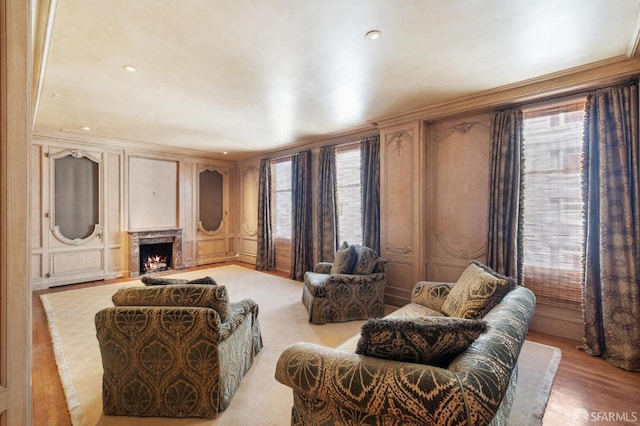 2000 Washington St Unit 4, San Francisco, CA 94109 - living area featuring a decorative wall, plenty of natural light, a high end fireplace, ornamental molding, and wood finished floors