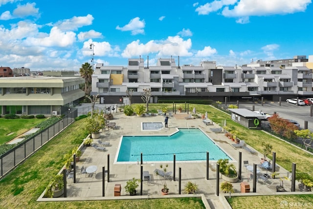 view of swimming pool with a patio area