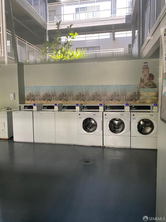 washroom featuring washer and dryer