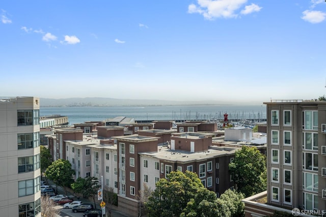 property's view of city with a water view