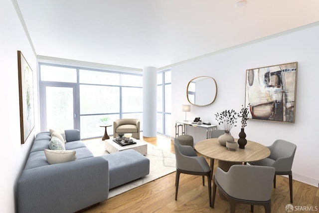 living room featuring light hardwood / wood-style floors, a wall of windows, and ornamental molding