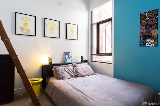 bedroom featuring carpet