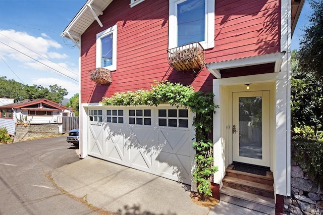 exterior space featuring a garage