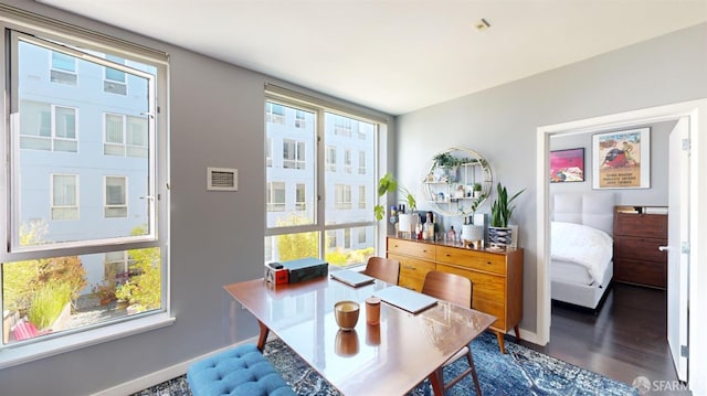 888 7th St Unit 234, San Francisco, CA 94107 - office area featuring plenty of natural light and dark hardwood / wood-style flooring