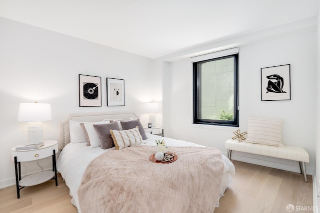 bedroom featuring light wood-type flooring