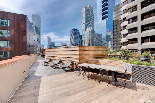 view of patio featuring a balcony