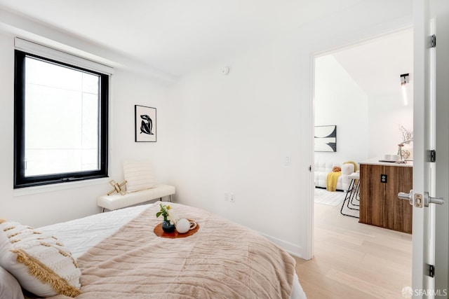 bedroom featuring light wood-type flooring