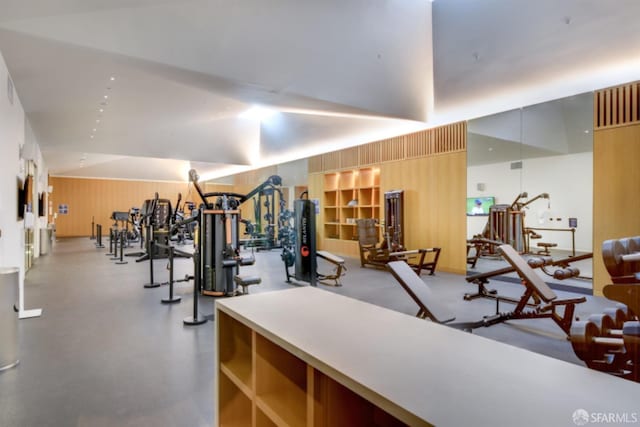 workout area with wood walls