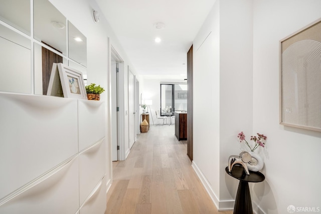 corridor featuring light wood-type flooring