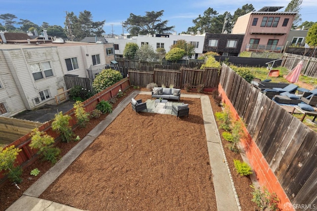 view of yard featuring outdoor lounge area