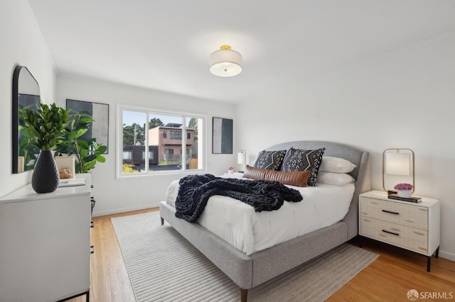 bedroom featuring wood-type flooring