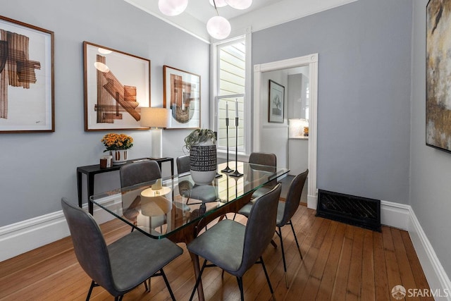 69 Pond St, San Francisco, CA 94114 - dining space featuring wood-type flooring and baseboards
