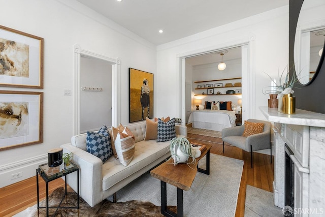 69 Pond St, San Francisco, CA 94114 - living area featuring wood finished floors, a fireplace, and recessed lighting