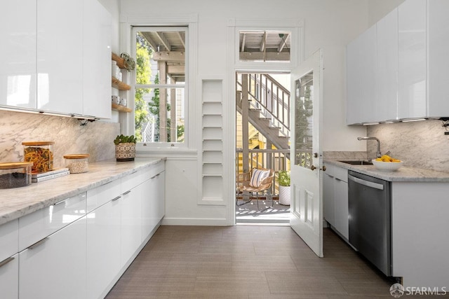 69 Pond St, San Francisco, CA 94114 - kitchen with dishwasher, white cabinetry, backsplash, and modern cabinets