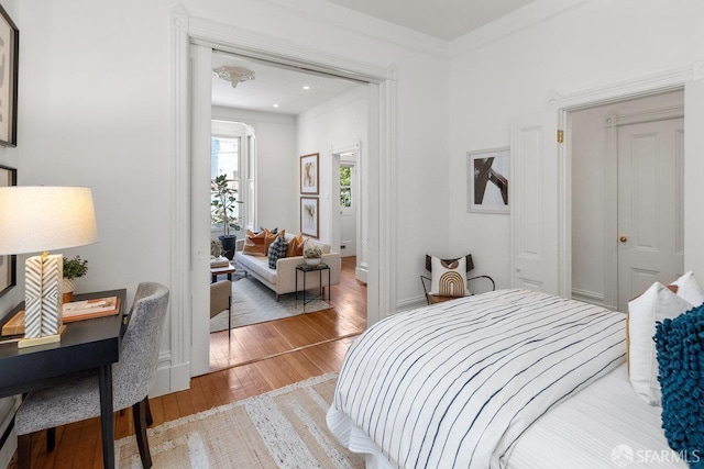 69 Pond St, San Francisco, CA 94114 - bedroom with light wood-type flooring and a desk