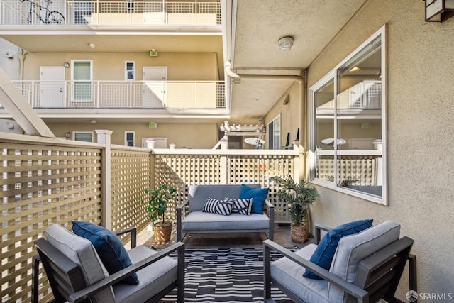 balcony featuring an outdoor hangout area