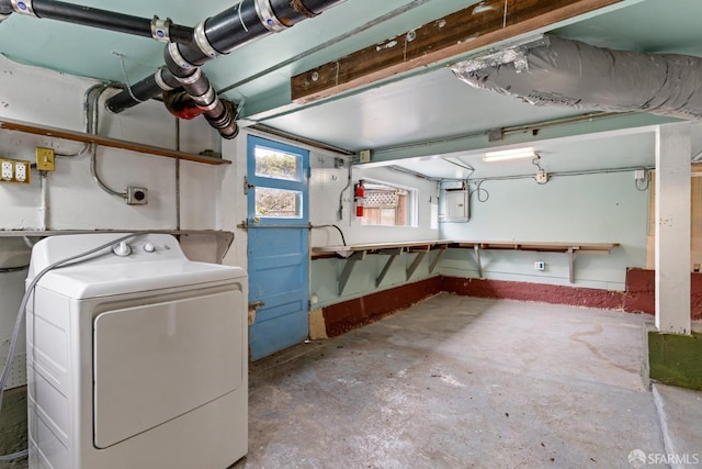 basement with washer / clothes dryer and electric panel