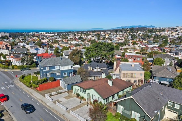 drone / aerial view featuring a mountain view and a residential view