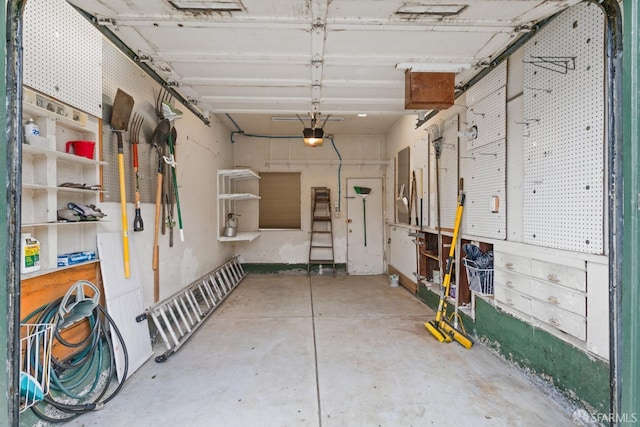 garage featuring a garage door opener