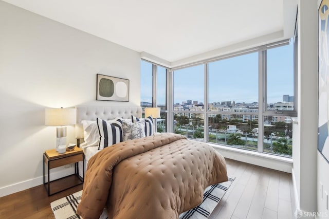 bedroom featuring wood-type flooring