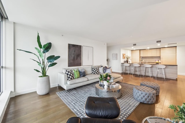 living room with wood-type flooring