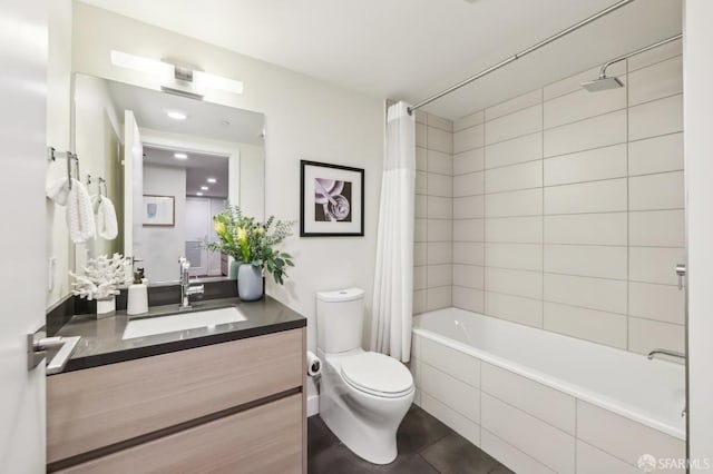 full bathroom with shower / tub combo with curtain, toilet, vanity, and tile patterned flooring