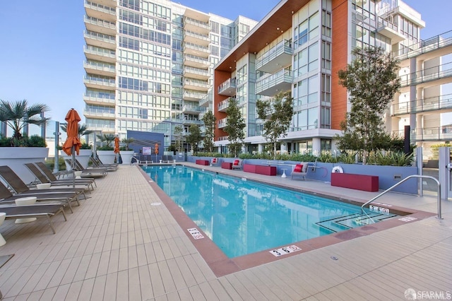 view of swimming pool featuring a patio