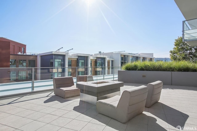 view of patio with a fire pit