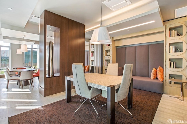 dining area with dark hardwood / wood-style flooring