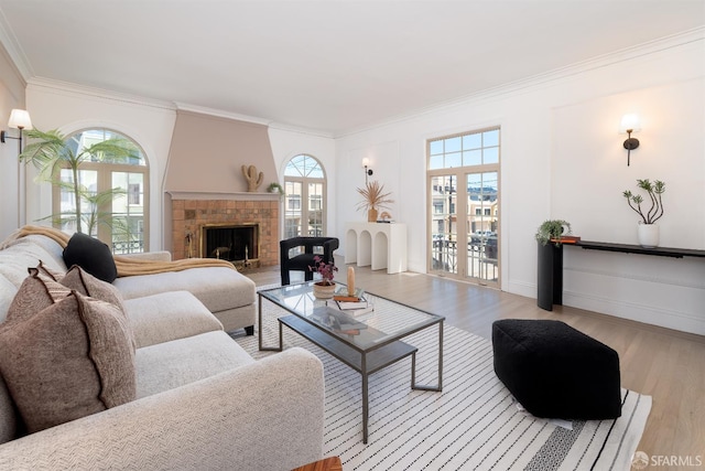 651 29th Ave, San Francisco, CA 94121 - living room with ornamental molding, wood finished floors, and a tiled fireplace