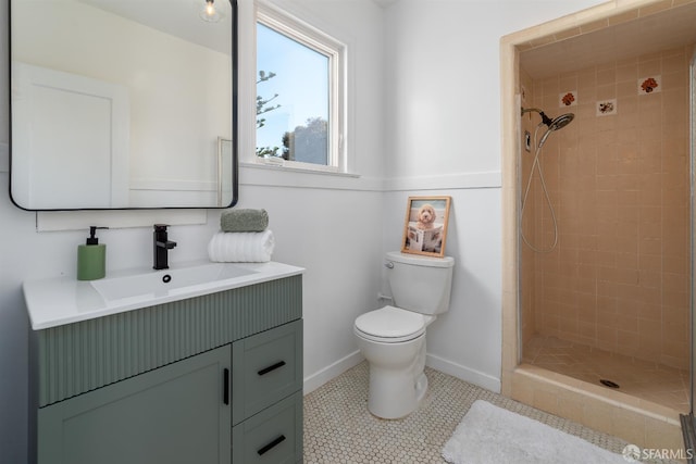 651 29th Ave, San Francisco, CA 94121 - bathroom with vanity, toilet, tiled shower, baseboards, and tile patterned floors