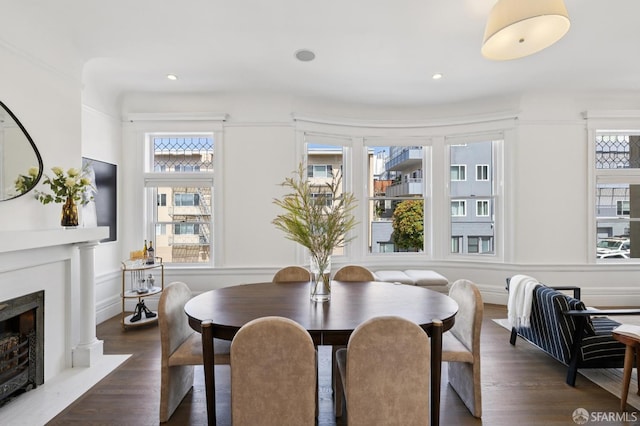 2427 Franklin St, San Francisco, CA 94123 - dining space featuring wood finished floors, a premium fireplace, a decorative wall, a wainscoted wall, and recessed lighting