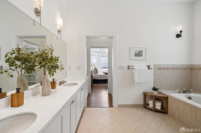 2427 Franklin St, San Francisco, CA 94123 - bathroom with tile patterned flooring, double vanity, a bath, and connected bathroom