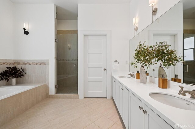 2427 Franklin St, San Francisco, CA 94123 - full bathroom featuring double vanity, tile patterned floors, a stall shower, and a garden tub