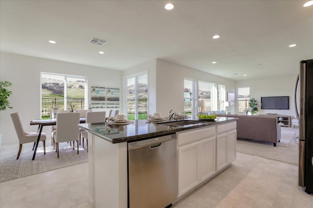 21051 Pinot Noir Dr, Patterson, CA 95363 - kitchen with appliances with stainless steel finishes, healthy amount of natural light, a sink, recessed lighting, and open floor plan