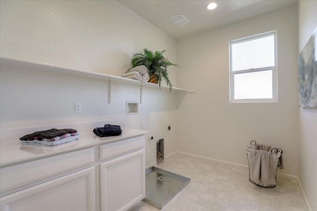 21051 Pinot Noir Dr, Patterson, CA 95363 - laundry area featuring hookup for an electric dryer, hookup for a washing machine, hookup for a gas dryer, baseboards, and light floors