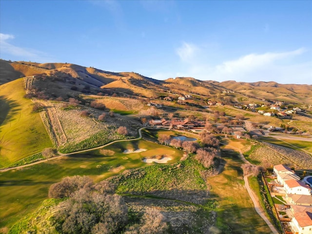 21051 Pinot Noir Dr, Patterson, CA 95363 - aerial perspective of suburban area with a mountain backdrop and a golf course