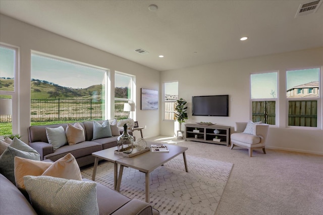 21051 Pinot Noir Dr, Patterson, CA 95363 - living room featuring light carpet, recessed lighting, and baseboards